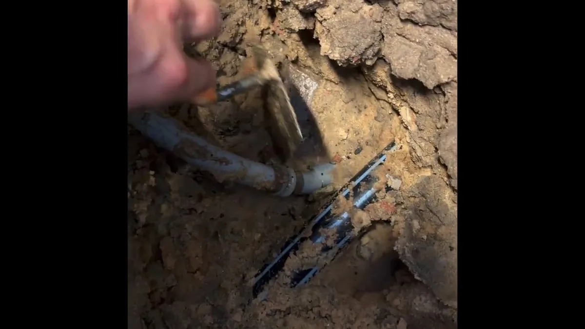 Excavated sewer lateral with damaged pipe exposed for repair for Sewer Line Repair in Fountain Valley, CA in Fountain Valley