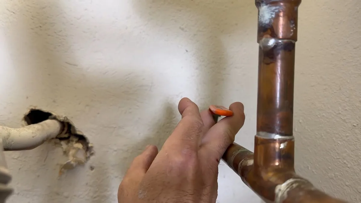 Water heater anode rod and tank connection showing mineral wear for The Fountain Valley Hard Water Guide in Fountain Valley